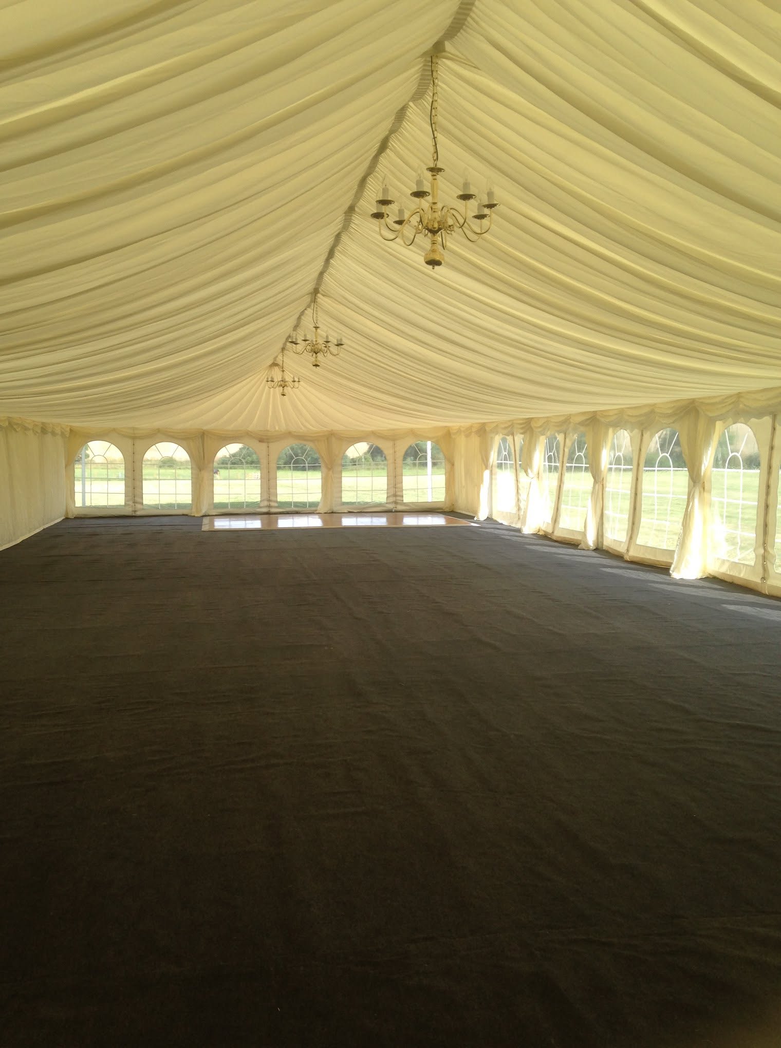 Marquee interior with chandeliers and linings